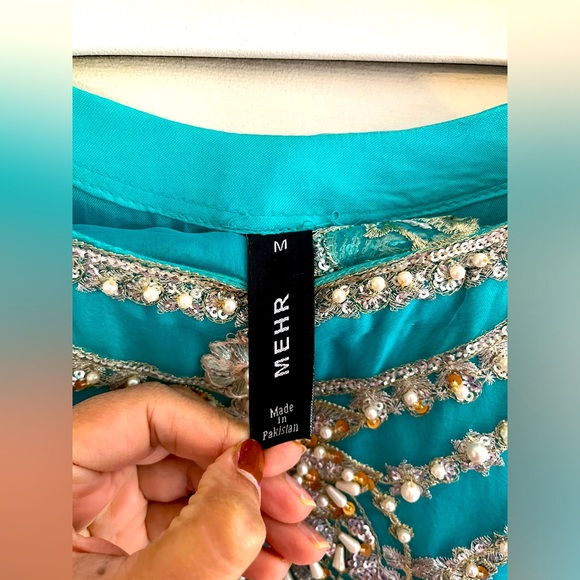 This Beautiful Mehr dress has full embroidery on its sleeve front and back. - Picture 3 of 4